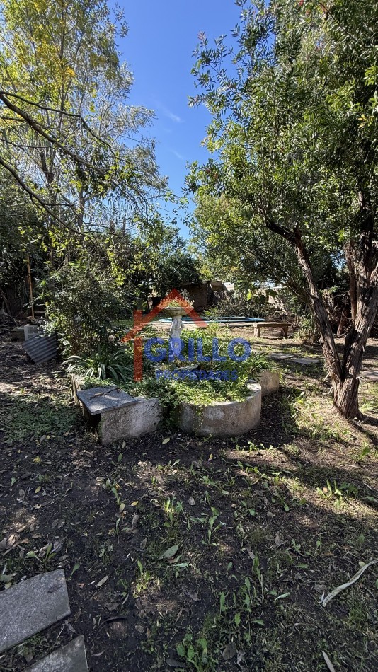 Casa 2 dormitorios, patio con pileta. 